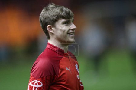 Photo for Luca Connell of Barnsley in the pregame warmup session during the Sky Bet League 1 match Carlisle United vs Barnsley at Brunton Park, Carlisle, United Kingdom, 12th March 202 - Royalty Free Image