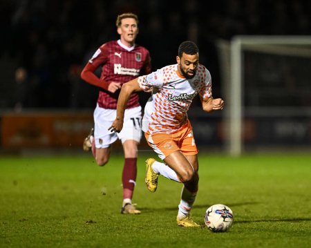 Photo for CJ Hamilton of Blackpool makes a break with the ball during the Sky Bet League 1 match Northampton Town vs Blackpool at Sixfields Stadium, Northampton, United Kingdom, 12th March 202 - Royalty Free Image