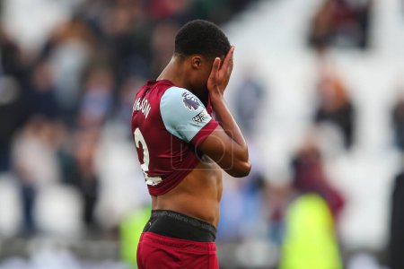 Photo for Ben Johnson of West Ham United is dejected after the final whistle of the Premier League match West Ham United vs Aston Villa at London Stadium, London, United Kingdom, 17th March 202 - Royalty Free Image