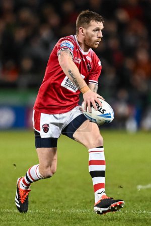 Photo for Marc Sneyd of Salford Red Devils makes a break during the Betfred Super League Round 5 match Salford Red Devils vs Wigan Warriors at Salford Community Stadium, Eccles, United Kingdom, 14th March 202 - Royalty Free Image
