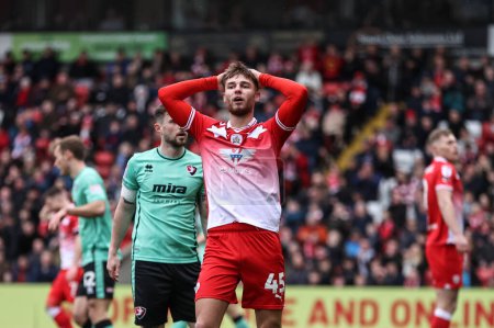 Photo for John Mcatee of Barnsley reacts after his shot is saved during the Sky Bet League 1 match Barnsley vs Cheltenham Town at Oakwell, Barnsley, United Kingdom, 16th March 202 - Royalty Free Image