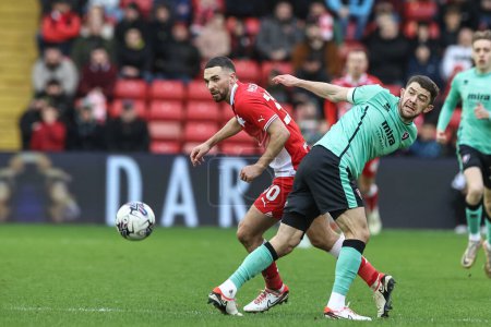Photo for Adam Phillips of Barnsley in action during the Sky Bet League 1 match Barnsley vs Cheltenham Town at Oakwell, Barnsley, United Kingdom, 16th March 202 - Royalty Free Image