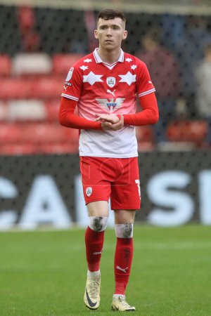 Photo for Conor Grant of Barnsley applauds the home fans after the game ends 0-0 during the Sky Bet League 1 match Barnsley vs Cheltenham Town at Oakwell, Barnsley, United Kingdom, 16th March 202 - Royalty Free Image