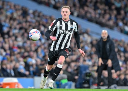 Photo for Sean Longstaff of Newcastle United chases down the ball, during the Emirates FA Cup Quarter- Final match Manchester City vs Newcastle United at Etihad Stadium, Manchester, United Kingdom, 16th March 202 - Royalty Free Image