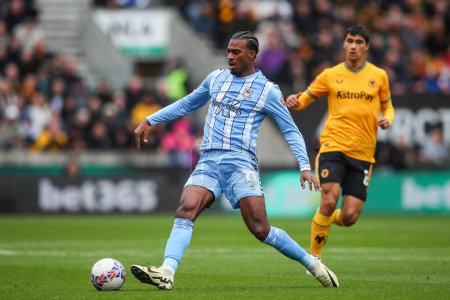 Photo for Haji Wright of Coventry City passes the ball during the Emirates FA Cup Quarter- Final match Wolverhampton Wanderers vs Coventry City at Molineux, Wolverhampton, United Kingdom, 16th March 202 - Royalty Free Image