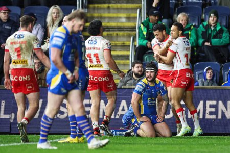 Photo for Waqa Blake of St. Helens celebrates his try during the Betfred Super League Round 5 match Leeds Rhinos vs St Helens at Headingley Stadium, Leeds, United Kingdom, 15th March 202 - Royalty Free Image