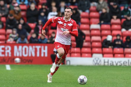 Photo for Josh Earl of Barnsley breaks with the ball during the Sky Bet League 1 match Barnsley vs Cheltenham Town at Oakwell, Barnsley, United Kingdom, 16th March 202 - Royalty Free Image
