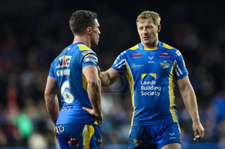 Photo for Lachlan Miller of Leeds Rhinos chats to Brodie Croft of Leeds Rhinos during the Betfred Super League Round 5 match Leeds Rhinos vs St Helens at Headingley Stadium, Leeds, United Kingdom, 15th March 202 - Royalty Free Image