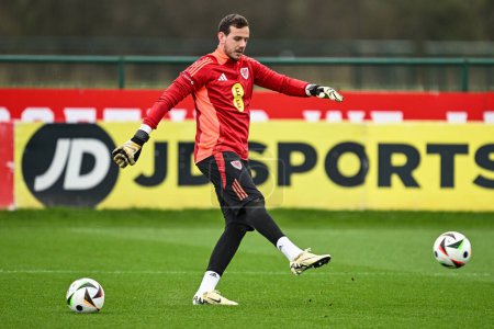 Photo for Danny Ward of Wales during warms up ahead of the Wales open training session at Vale Resort Training complex, Hensol, United Kingdom, 20th March 2024 - Royalty Free Image