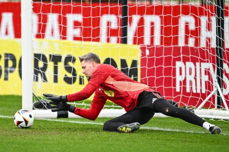 Photo for Wayne Hennessey of Wales during warms up ahead of the Wales open training session at Vale Resort Training complex, Hensol, United Kingdom, 20th March 2024 - Royalty Free Image