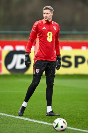 Photo for Wayne Hennessey of Wales during warms up ahead of the Wales open training session at Vale Resort Training complex, Hensol, United Kingdom, 20th March 2024 - Royalty Free Image