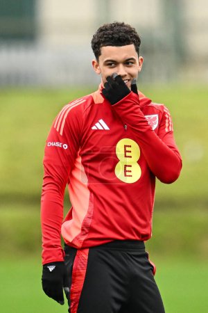 Photo for Brennan Johnson of Wales during warms up ahead of the Wales open training session at Vale Resort Training complex, Hensol, United Kingdom, 20th March 2024 - Royalty Free Image