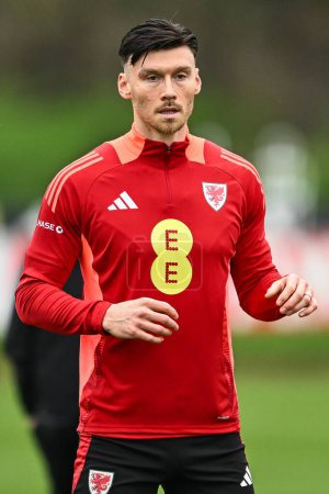 Photo for Kieffer Moore of Wales during warms up ahead of the Wales open training session at Vale Resort Training complex, Hensol, United Kingdom, 20th March 2024 - Royalty Free Image