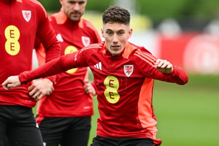 Photo for Harry Wilson of Wales during warms up ahead of the Wales open training session at Vale Resort Training complex, Hensol, United Kingdom, 20th March 2024 - Royalty Free Image