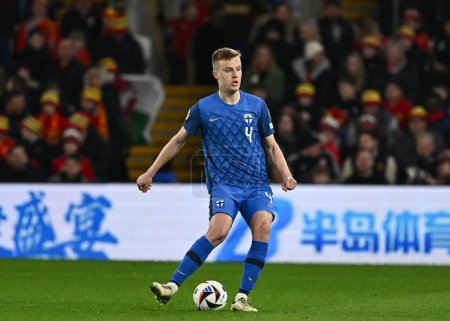 Photo for Robert Ivanov of Finland passes the ball, during the UEFA Euro Qualifiers Play-Off Semi-Final match Wales vs Finland at Cardiff City Stadium, Cardiff, United Kingdom, 21st March 202 - Royalty Free Image