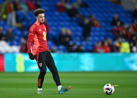 Photo for Ethan Ampadu of Wales warms up ahead of the match, during the UEFA Euro Qualifiers Play-Off Semi-Final match Wales vs Finland at Cardiff City Stadium, Cardiff, United Kingdom, 21st March 202 - Royalty Free Image