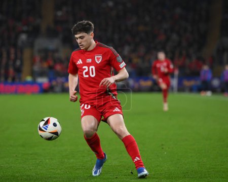 Photo for Daniel James of Wales breaks forward with the ball, during the UEFA Euro Qualifiers Play-Off Semi-Final match Wales vs Finland at Cardiff City Stadium, Cardiff, United Kingdom, 21st March 202 - Royalty Free Image