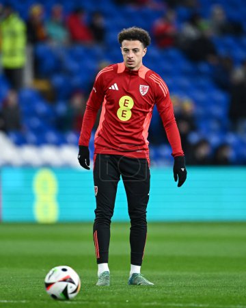 Photo for Ethan Ampadu of Wales warms up ahead of the match, during the UEFA Euro Qualifiers Play-Off Semi-Final match Wales vs Finland at Cardiff City Stadium, Cardiff, United Kingdom, 21st March 202 - Royalty Free Image
