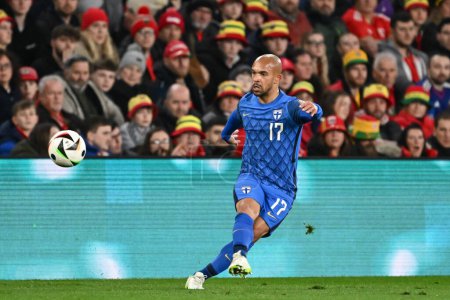 Photo for Nikolai Alho of Finland crosses the ball, during the UEFA Euro Qualifiers Play-Off Semi-Final match Wales vs Finland at Cardiff City Stadium, Cardiff, United Kingdom, 21st March 202 - Royalty Free Image