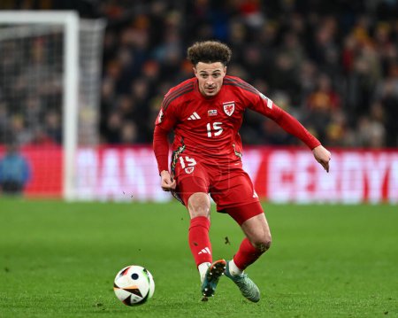 Photo for Ethan Ampadu of Wales passes the ball, during the UEFA Euro Qualifiers Play-Off Semi-Final match Wales vs Finland at Cardiff City Stadium, Cardiff, United Kingdom, 21st March 202 - Royalty Free Image