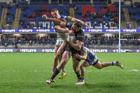 Photo for Alex Walmsley of St. Helens powers through to score a try during the Betfred Challenge Cup Sixth Round match Leeds Rhinos vs St Helens at Headingley Stadium, Leeds, United Kingdom, 22nd March 202 - Royalty Free Image
