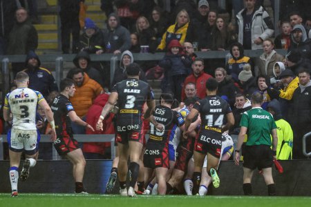 Photo for An altercation between both teams during the Betfred Challenge Cup Sixth Round match Leeds Rhinos vs St Helens at Headingley Stadium, Leeds, United Kingdom, 22nd March 202 - Royalty Free Image