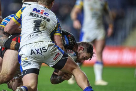 Photo for Daryl Clark of St. Helens goes over for a try during the Betfred Challenge Cup Sixth Round match Leeds Rhinos vs St Helens at Headingley Stadium, Leeds, United Kingdom, 22nd March 202 - Royalty Free Image
