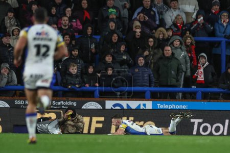 Photo for Harry Newman of Leeds Rhinos goes over for a 70 yard solo try during the Betfred Challenge Cup Sixth Round match Leeds Rhinos vs St Helens at Headingley Stadium, Leeds, United Kingdom, 22nd March 202 - Royalty Free Image