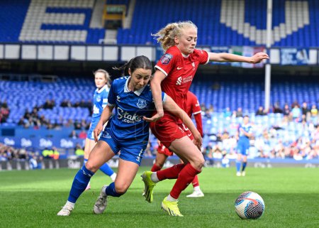 Photo for Clare Wheeler of Everton Women and Grace Fisk of Liverpool Women battle for the ball, during The FA Women's Super League match Everton Women vs Liverpool Women at Goodison Park, Liverpool, United Kingdom, 24th March 202 - Royalty Free Image