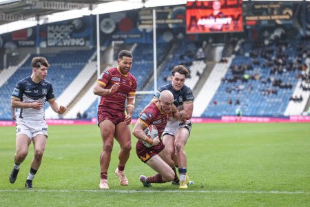 Photo for Adam Swift of Huddersfield Giants goes over for his fourth try to make it 48-6  during the Betfred Challenge Cup Sixth Round match Huddersfield Giants vs Hull FC at John Smith's Stadium, Huddersfield, United Kingdom, 23rd March 202 - Royalty Free Image
