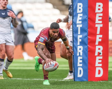 Photo for Kevin Naiqama of Huddersfield Giants goes over for a try to make it 8-0 during the Betfred Challenge Cup Sixth Round match Huddersfield Giants vs Hull FC at John Smith's Stadium, Huddersfield, United Kingdom, 23rd March 202 - Royalty Free Image
