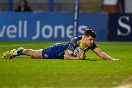 Photo for Josh Thewlis of Warrington Wolves goes over for a try during the Betfred Challenge Cup Sixth Round match Warrington Wolves vs London Broncos at Halliwell Jones Stadium, Warrington, United Kingdom, 23rd March 202 - Royalty Free Image