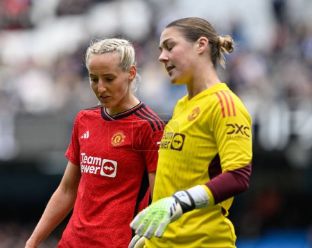 Photo for Millie Turner of Manchester United Women speaks with Mary Earps of Manchester United Women, during the The FA Women's Super League match Manchester City Women vs Manchester United Women at Etihad Stadium, Manchester, United Kingdom, 23rd March 202 - Royalty Free Image