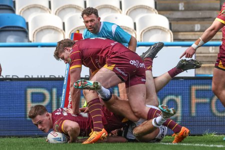Photo for Sam Halsall of Huddersfield Giants goes over for a try to make it 14-6 during the Betfred Challenge Cup Sixth Round match Huddersfield Giants vs Hull FC at John Smith's Stadium, Huddersfield, United Kingdom, 23rd March 202 - Royalty Free Image