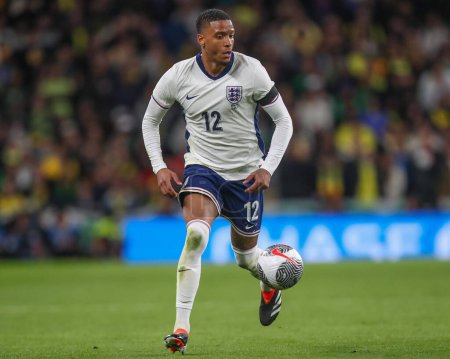 Photo for Ezri Konsa of England breaks with the ball during the International Friendly match England vs Brazil at Wembley Stadium, London, United Kingdom, 23rd March 202 - Royalty Free Image
