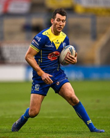Photo for Stefan Ratchford of Warrington Wolves makes a break during the Betfred Challenge Cup Sixth Round match Warrington Wolves vs London Broncos at Halliwell Jones Stadium, Warrington, United Kingdom, 23rd March 202 - Royalty Free Image