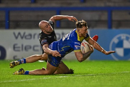 Photo for Matty Ashton of Warrington Wolves goes over for a try during the Betfred Challenge Cup Sixth Round match Warrington Wolves vs London Broncos at Halliwell Jones Stadium, Warrington, United Kingdom, 23rd March 202 - Royalty Free Image