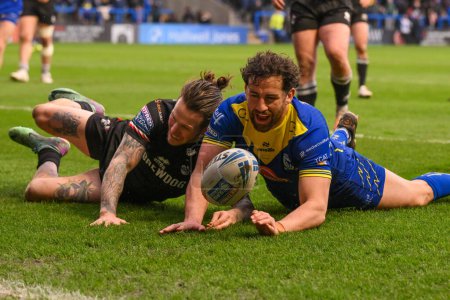 Photo for Toby King of Warrington Wolves goes over for a try during the Betfred Challenge Cup Sixth Round match Warrington Wolves vs London Broncos at Halliwell Jones Stadium, Warrington, United Kingdom, 23rd March 202 - Royalty Free Image