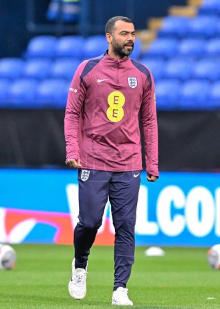 Photo for Ashley Cole Assistant Manager of England inspects the pitch ahead of the match, during the UEFA Euro U21 Qualifiers Group F match England U21 vs Luxembourg U21 at Toughsheet Community Stadium, Bolton, United Kingdom, 26th March 202 - Royalty Free Image