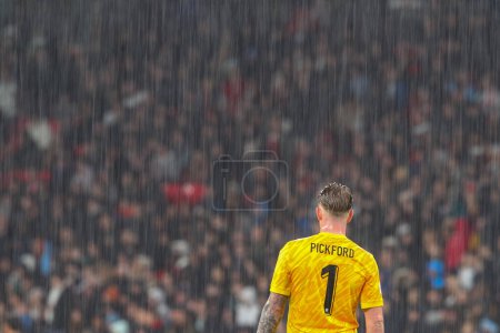 Photo for Heavy rain continues to pour at Wembley as Jordan Pickford of England looks on during the International Friendly match England vs Belgium at Wembley Stadium, London, United Kingdom, 26th March 202 - Royalty Free Image