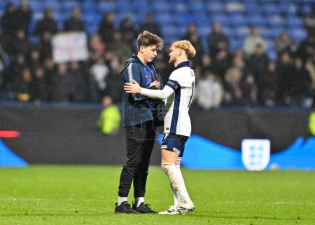Photo for Harvey Elliott of England speaks with young fan full time, during the UEFA Euro U21 Qualifiers Group F match England U21 vs Luxembourg U21 at Toughsheet Community Stadium, Bolton, United Kingdom, 26th March 202 - Royalty Free Image