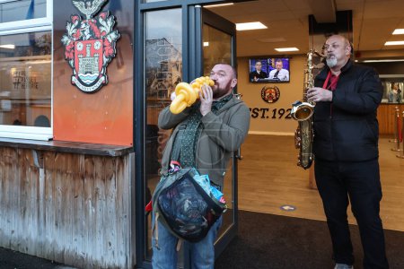 Photo for Fans arrive at the game during the Betfred Super League Round 6 match Castleford Tigers vs Leeds Rhinos at The Mend-A-Hose Jungle, Castleford, United Kingdom, 28th March 202 - Royalty Free Image