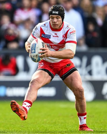 Photo for Jonny Lomax of St. Helens makes a break during the Betfred Super League Round 6 match St Helens vs Wigan Warriors at Totally Wicked Stadium, St Helens, United Kingdom, 29th March 202 - Royalty Free Image