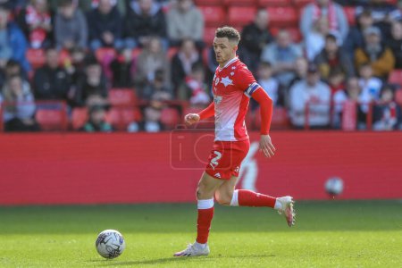 Photo for Jordan Williams of Barnsley breaks with the ball during the Sky Bet League 1 match Barnsley vs Cambridge United at Oakwell, Barnsley, United Kingdom, 29th March 202 - Royalty Free Image