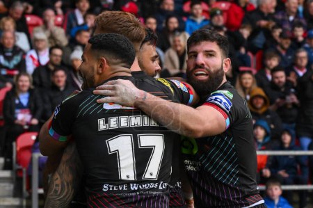 Photo for Bevan French of Wigan Warriors celebrates his try during the Betfred Super League Round 6 match St Helens vs Wigan Warriors at Totally Wicked Stadium, St Helens, United Kingdom, 29th March 202 - Royalty Free Image