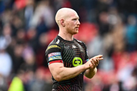 Photo for Liam Farrell of Wigan Warriors applauds the fans at the end of the Betfred Super League Round 6 match St Helens vs Wigan Warriors at Totally Wicked Stadium, St Helens, United Kingdom, 29th March 202 - Royalty Free Image