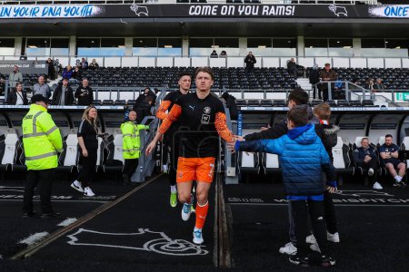 Photo for George Byers of Blackpool during the pre-game warm up ahead of the Sky Bet League 1 match Derby County vs Blackpool at Pride Park Stadium, Derby, United Kingdom, 29th March 202 - Royalty Free Image