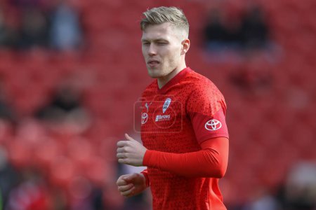 Photo for Sam Cosgrove of Barnsley in the pregame warmup session during the Sky Bet League 1 match Barnsley vs Cambridge United at Oakwell, Barnsley, United Kingdom, 29th March 202 - Royalty Free Image