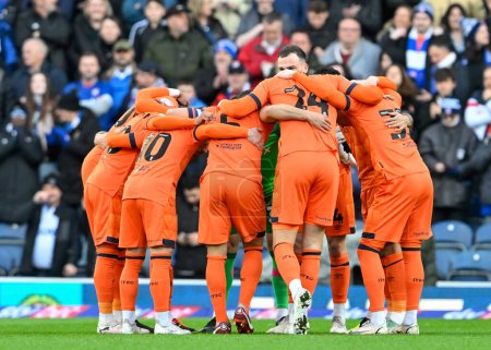 Photo for Ipswich Town have a team huddle ahead of kick off, during the Sky Bet Championship match Blackburn Rovers vs Ipswich Town at Ewood Park, Blackburn, United Kingdom, 29th March 202 - Royalty Free Image