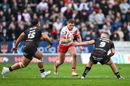 Photo for Morgan Knowles of St. Helens makes a break during the Betfred Super League Round 6 match St Helens vs Wigan Warriors at Totally Wicked Stadium, St Helens, United Kingdom, 29th March 202 - Royalty Free Image